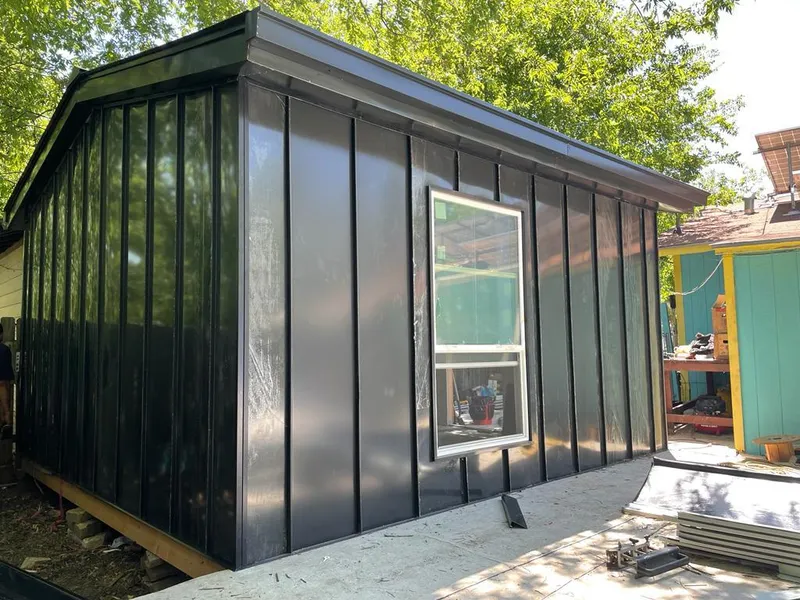 Black standing seam metal wall panels for Metal Roof Installation in Morrisville